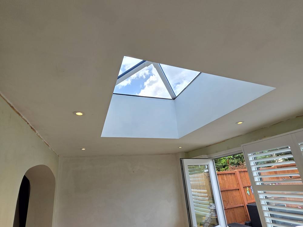 Recessed LED ceiling spotlights installed by NSS Electrics in a bright living space